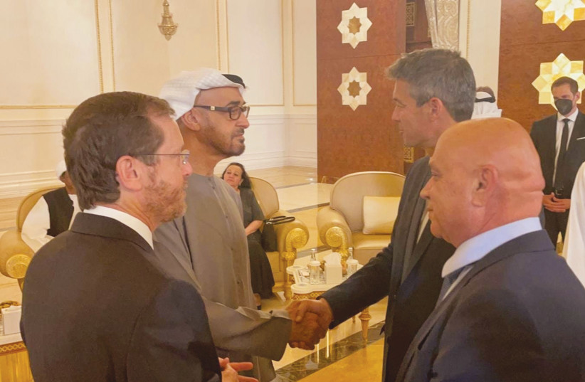  COMMUNICATIONS MINISTER Yoaz Hendel offers his condolences to President Sheikh Mohammed bin Zayed on the death of his brother, as President Isaac Herzog and Regional Cooperation Minister Esawi Frej look on (photo credit: PRESIDENT'S OFFICE)