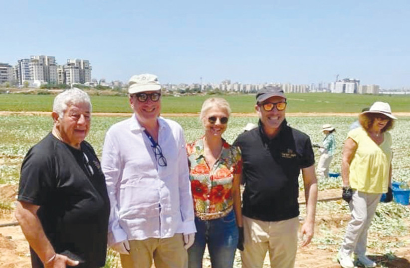  FRENCH AMBASSADOR Eric Danon (second from left) and his wife, Marie, with Leket personnel with whom they engaged in food rescue (credit: LEKET ISRAEL)