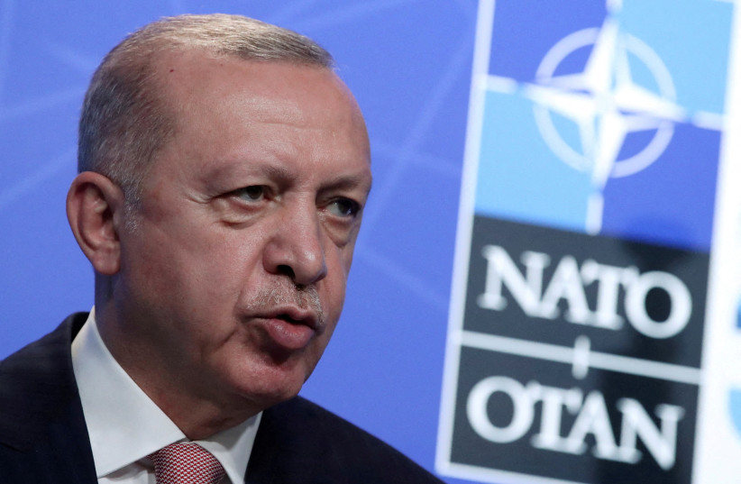 Turkey's President Tayyip Erdogan holds a news conference during the NATO summit at the Alliance's headquarters in Brussels, Belgium June 14, 2021.  (photo credit: REUTERS/Yves Herman/Pool/File Photo)