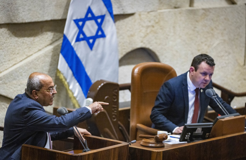MK Ahmad Tibi attends a plenum session in the assembly hall of the Israeli parliament on May 16, 2022. (photo credit: OLIVIER FITOUSSI/FLASH90)