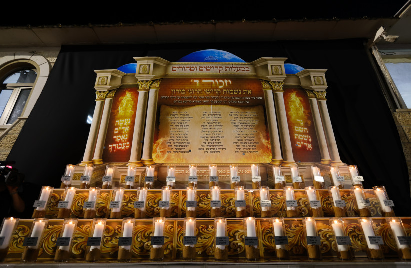  View of candles in memory of the 45 lost lives at last year's Mount Meron disaster, during Lag Baomer celebrations, in Meron on May 18, 2022. (photo credit: David Cohen/Flash90)