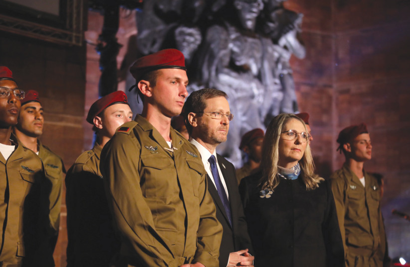  President Isaac Herzog and his wife, Michal, at the Yad Vashem ceremony on Holocaust Remembrance Day eve, April 27. (photo credit: MARC ISRAEL SELLEM)