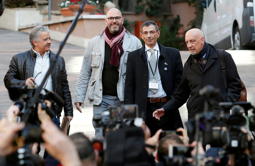  Pedro Salinas, Francois Devaux, Francesco Zanardi and Peter Iseley, survivors of sexual abuse, talk to reporters outside the Vatican in Rome, Italy February 20, 2019 (credit: REUTERS/REMO CASILLI)