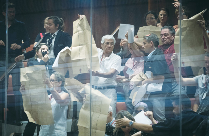  ACTIVISTS HOLD copies of the Declaration of Independence in the visitors’ gallery during a debate in the Knesset over the Nation-State Law in 2018.  (photo credit: YONATAN SINDEL/FLASH90)