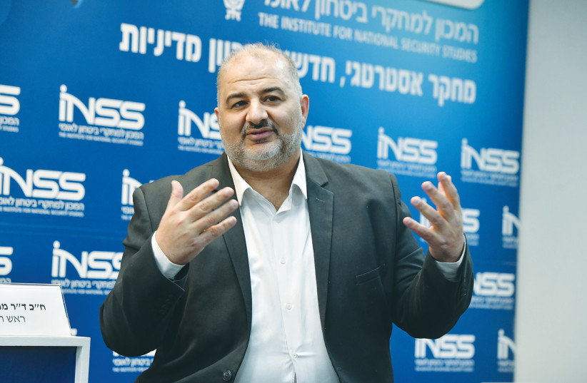  MK MANSOUR ABBAS speaks at a conference of The Institute for National Security Studies in Tel Aviv, last month. The head of Ra’am, an Islamist, recognizes Israel as the nation-state of the Jewish people. (photo credit: AVSHALOM SASSONI/MAARIV)