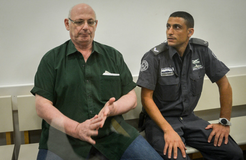  Shimon Cooper seen at the court room where he was convicted of murdering his first and his third wife, and staging their suicides, on June 28, 2016. (credit: FLASH90)