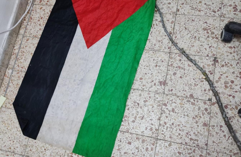  Palestinian flag captured by Israel Police from an Arab who raised it in Jerusalem. (credit: ISRAEL POLICE)