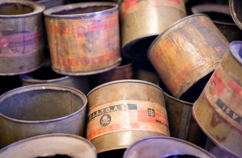  Empty poison gas cans of the pesticide Zyklon B are exhibited in the museum of the former concentration camp Auschwitz. (photo credit: KAY NIETFELD/PICTURE ALLIANCE VIA GETTY IMAGES)