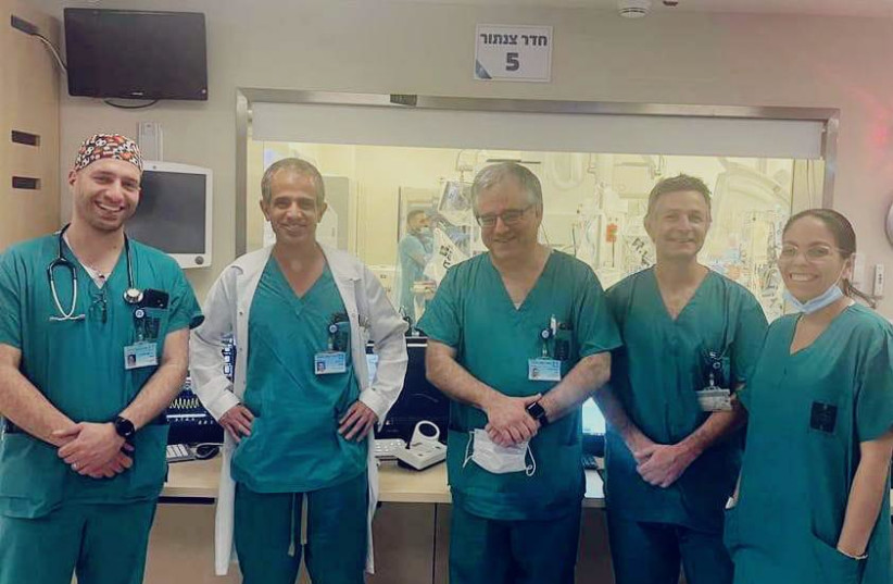  Pictured from the right: Dr. Gabby Elbaz-Greener, Dr. David Planer, Prof. Ronen Beeri, Director of the Echocardiography Unit and a Senior Anesthesiologist, Dr. Amit Korach, Dr. Tamer Abu Jreis. (photo credit: HADASSAH SPOKESPERSON)