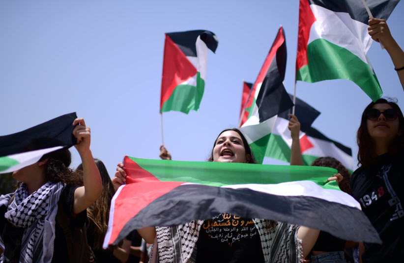 Arab Israelis and Israeli left wing activist students, attend a rally marking the Nakba anniversary at the Tel Aviv University on May 15, 2022 (photo credit: TOMER NEUBERG/FLASH90)