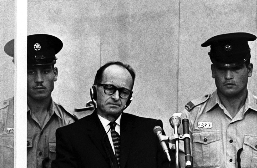  ADOLF EICHMANN listens to court proceedings at his trial in Jerusalem, in 1961. The following year, he was executed after being found guilty for crimes against humanity. (photo credit: REUTERS)