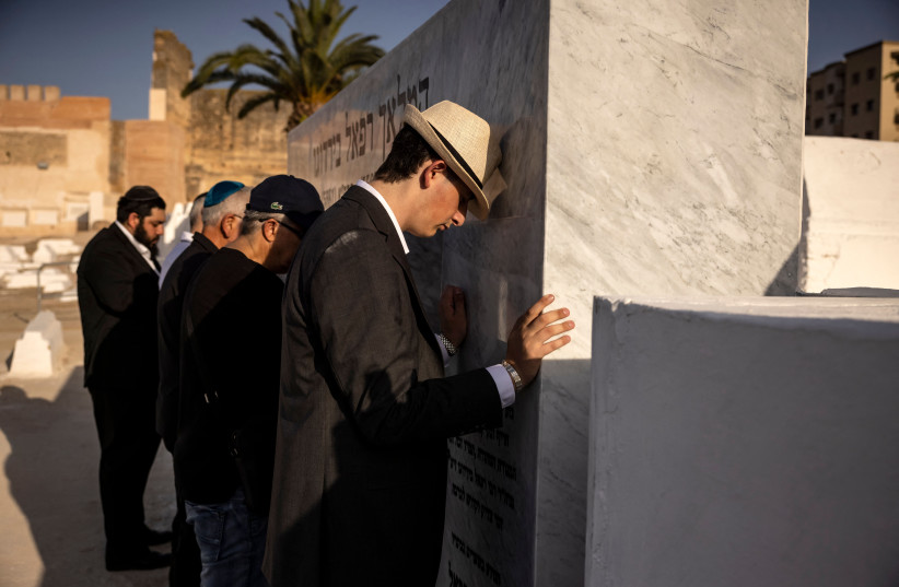  Jews pray at the Jewish cemetery of Meknes, Morocco, May 18, 2022. (photo credit: FADEL SENNA/AFP VIA GETTY IMAGES/JTA)