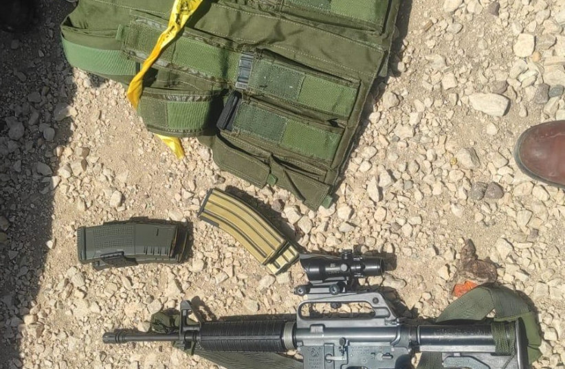  Vest and M16 guns confiscated during an IDF raid in Jenin, May 24, 2022.  (credit: IDF SPOKESPERSON'S UNIT)