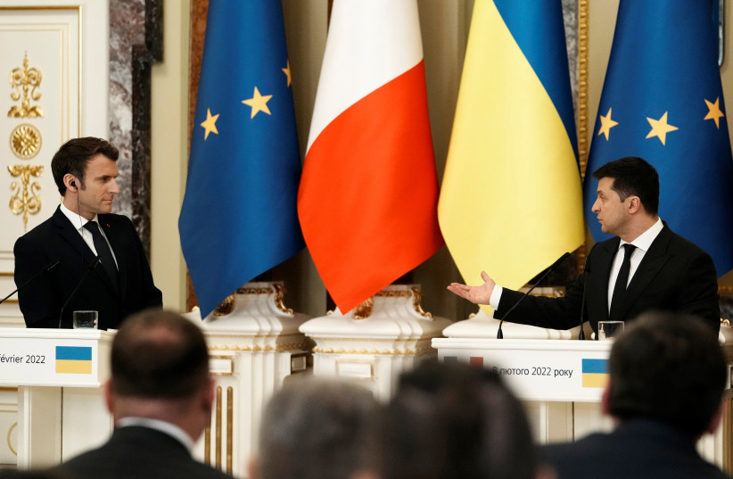  French President Emmanuel Macron and Ukrainian President Volodymyr Zelenskiy hold a joint news conference in Kyiv, Ukraine February 8, 2022.  (photo credit: Thibault Camus/Pool via REUTERS)