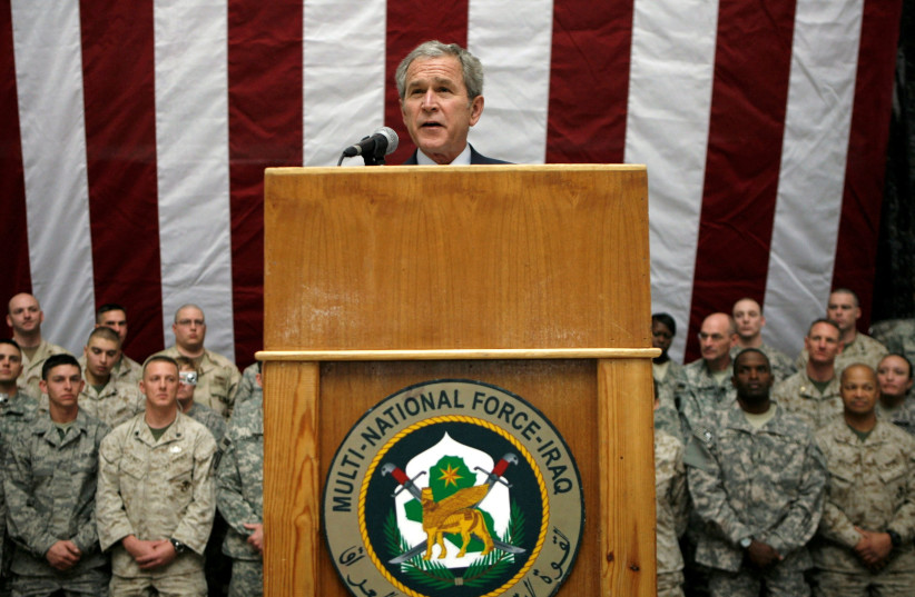  US President George W. Bush speaks to US troops from Al Faw Palace at Camp Victory in Baghdad December 14, 2008 (credit: REUTERS/KEVIN LAMARQUE)