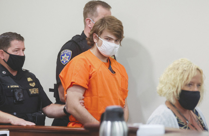 Buffalo shooting suspect Payton S. Gendron appears in court accused of killing 10 people in a supermarket earlier this month. How did some purported experts link this Jew-hater’s Great Replacement theory rants to a Zionist ‘opposition to the Palestinian right of return’?  (photo credit: REUTERS)