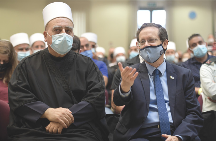  PRESIDENT ISAAC HERZOG and the spiritual leader of the Druze community, Sheikh Mowafaq Tarif, in July 2021. (photo credit: KOBI GIDEON/GPO)