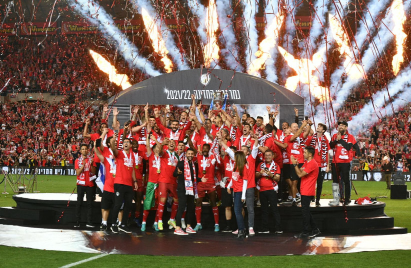  The winners of the Israel State Cup, Hapoel Beersheba, are seen after their victory over Maccabi Haifa, in Jerusalem's Teddy Stadium, on May 24, 2022. (credit: HAIM ZACH/GPO)