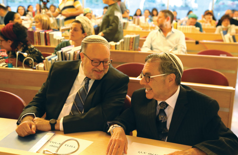  Rabbi Shlomo Riskin (right), Founder and Rosh HaYeshiva of Ohr Torah Stone, chats with his successor, OTS President and Rosh HaYeshiva Rabbi Kenneth Brander (photo credit: GERSHON ELLINSON)