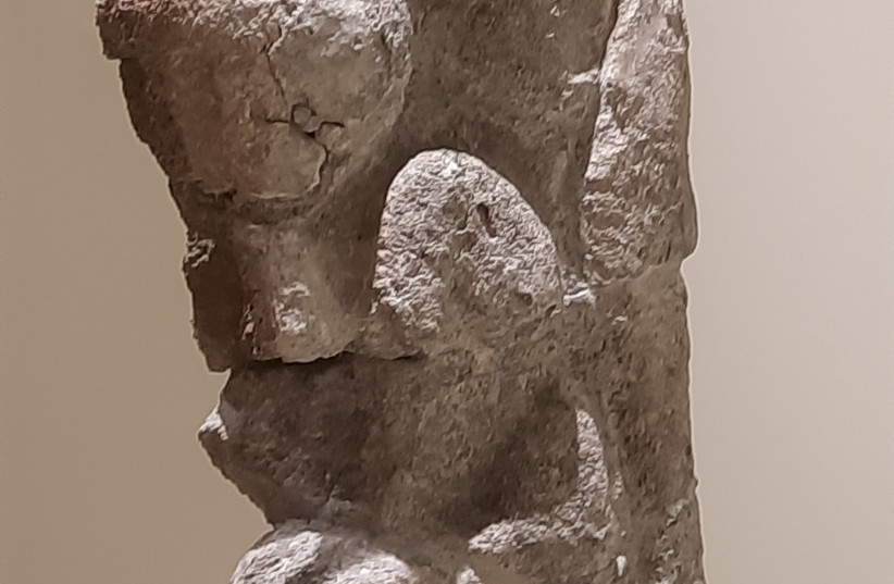  Impressive three-dimentional sculpture of a man              carrying a leapord from Göbeklitepe on exhibit at the              Şanlıurfa Archaeology Museum. (photo credit: JUDITH              SUDILOVSKY)