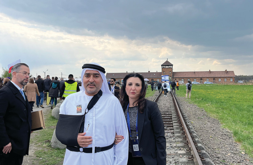 THE WRITER PARTICIPATES in the March of the Living last month on Holocaust Remembrance Day with Ahmed Obaid Al Mansoori, the first Emirati to ever take part.  (photo credit: FLEUR HASSAN-NAHOUM)