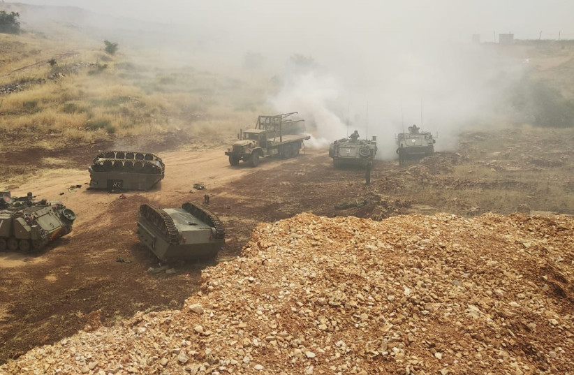  Armored Personnel Carriers train during the third week of ''Chariot of Fire,'' the largest drill in IDF history. (credit: IDF SPOKESPERSON'S UNIT)