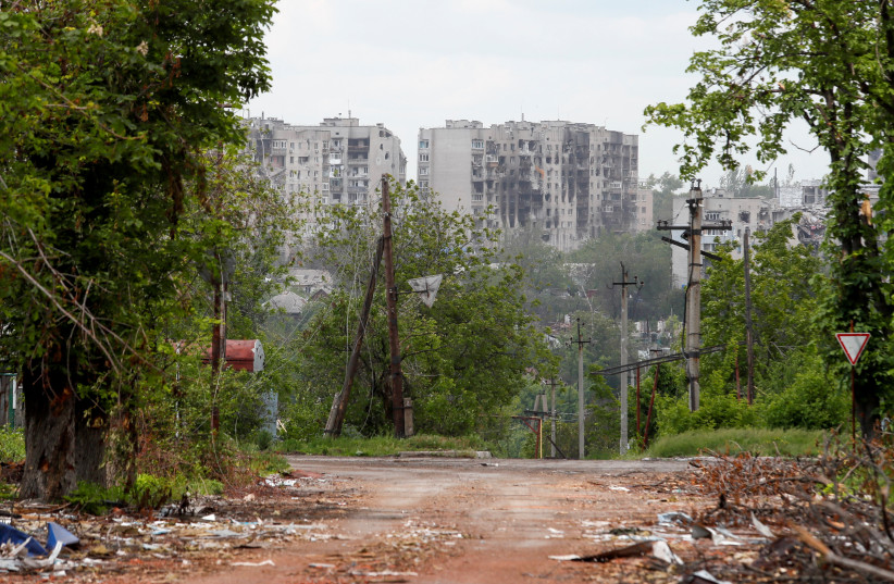 A view shows apartment buildings damaged during Ukraine-Russia conflict in the town of Popasna in the Luhansk region, Ukraine, May 27, 2022 (credit: REUTERS/ALEXANDER ERMOCHENKO)