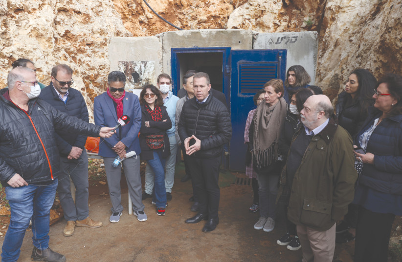  ISRAEL’S UN AMBASSADOR Gilad Erdan guides 12 counterparts from around the world on a visit to the Lebanese border to view a Hezbollah tunnel that crossed into Israel, last December.  (photo credit: DAVID COHEN/FLASH 90)