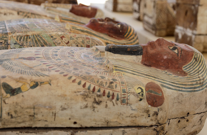 Sarcophaguses that are around 2500 years old, from the newly discovered burial site near Egypt's Saqqara necropolis, are displayed during a presentation in Giza, Egypt May 30, 2022 (photo credit: REUTERS/MOHAMED ABD EL GHANY)