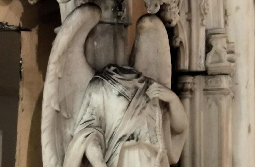  Someone got inside a New York City church and severed a head on an angel statue (photo credit: DESALES MEDIA GROUP/DIOCESE OF BROOKLYN/TNS)