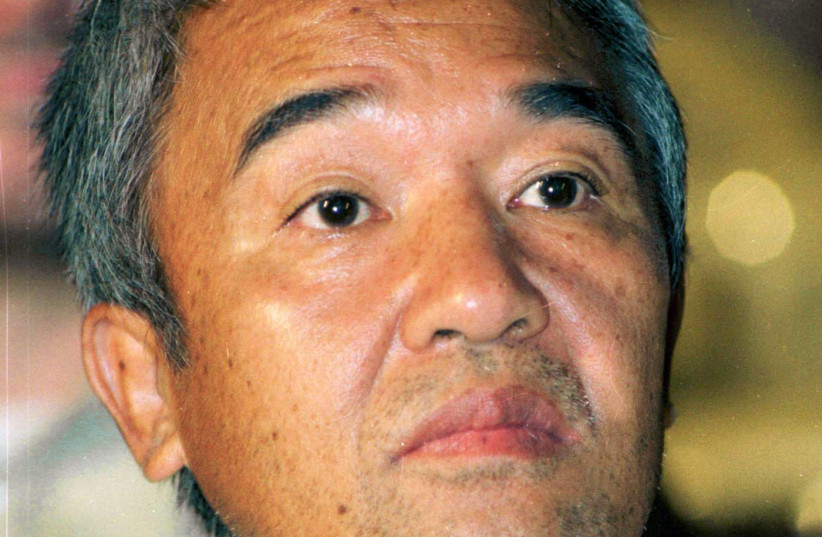  Kozo Okamoto, the ex-Japanese Red Army guerrilla who is wanted in Japan on terrorism charges, listens during a Hezbollah (Party of God) rally in Beirut October 5, 2000. (credit: REUTERS)