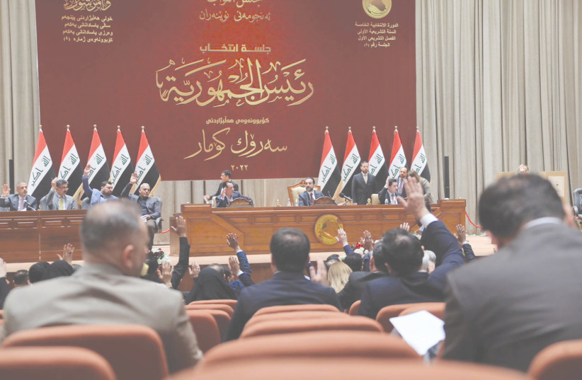  IRAQI LAWMAKERS attend a session of parliament in Baghdad, in March. There have been calls for normalization with Israel, but the Iraqi parliament last week passed a law rejecting any such notion. (photo credit: Iraqi Parliament Media Office/Reuters)