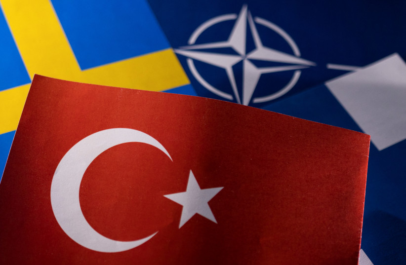 NATO, Turkish, Swedish and Finnish flags are seen in this illustration taken May 18, 2022. (photo credit: REUTERS/DADO RUVIC/ILLUSTRATION)