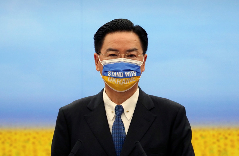  Taiwan's Foreign Minister Joseph Wu attends a news conference on Taiwan's humanitarian aid for Ukraine, in Taipei, Taiwan April 1, 2022. (credit: REUTERS/FABIAN HAMACHER)