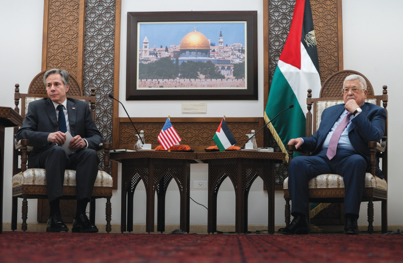  US Secretary of State Antony Blinken meets with PA leader Mahmoud Abbas in Ramallah, in March. The Biden administration treats leaders of the PA as children or worse, says the writer. (photo credit: Jacquelyn Martin/Reuters)