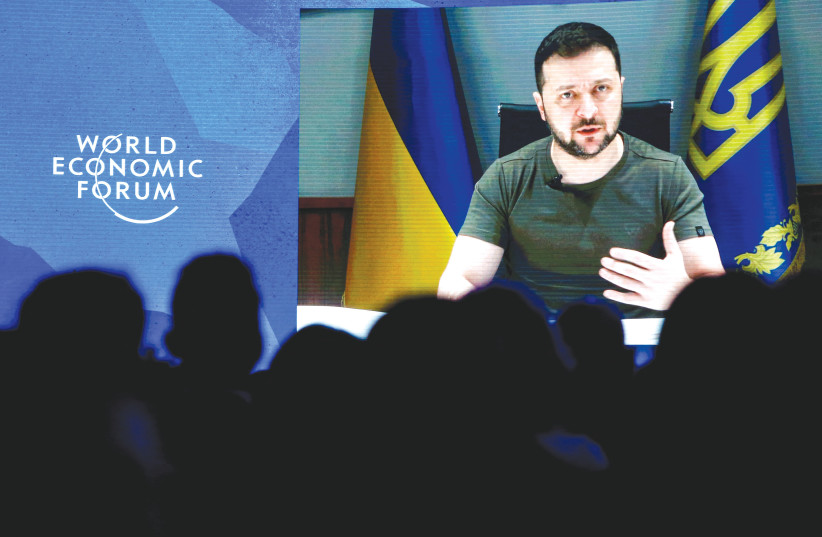 UKRAINIAN PRESIDENT Volodymyr Zelensky delivers a video address to the World Economic Forum in Davos, last week. There is barely a speech where Zelensky does not pepper it with talk of victory, says the writer. (photo credit: Arnd Wiegmann/Reuters)