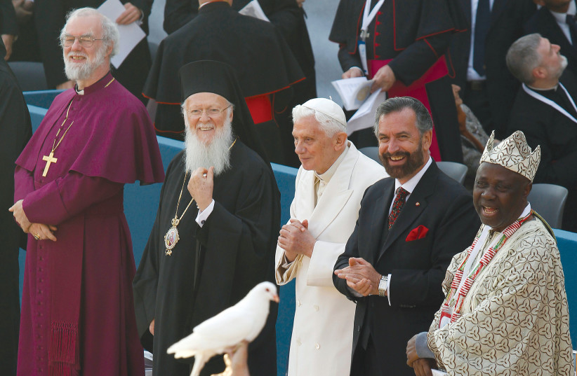  From left: Archbishop of Canterbury Rowan Williams, Ecumenical Patriarch Bartolomeo I, Pope Benedict XVI, Rabbi David Rosen, and Wande Abimbola of Nigeria, attend the ‘Prayer for Peace,’ an inter-religious meeting in Assisi on October 27, 2011. (credit: GIAMPIERO SPOSITO/REUTERS)