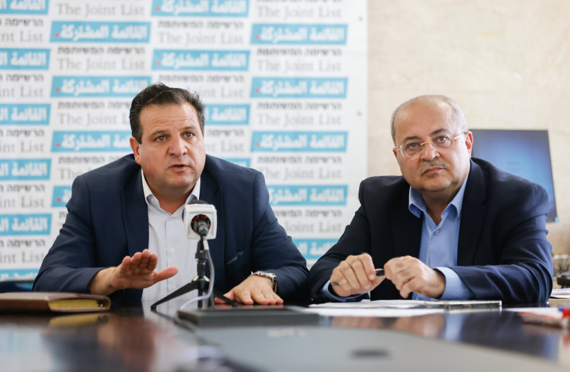  ‘HOW CAN it be a destruction if you have a functioning government?’: Joint List heads Ahmad Tibi (R) and Ayman Odeh at the Knesset, May 30.  (credit: OLIVIER FITOUSSI/FLASH90)