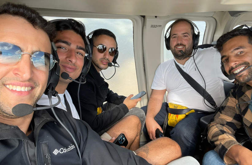  IN THE clouds (from L): Delegation members Elad Tschuva, Oren Nathan, Bar Haddad, Ohad Shmilovitz and Netanel Shahar on a helicopter ride around the Bay.   (credit: BELEV ECHAD)