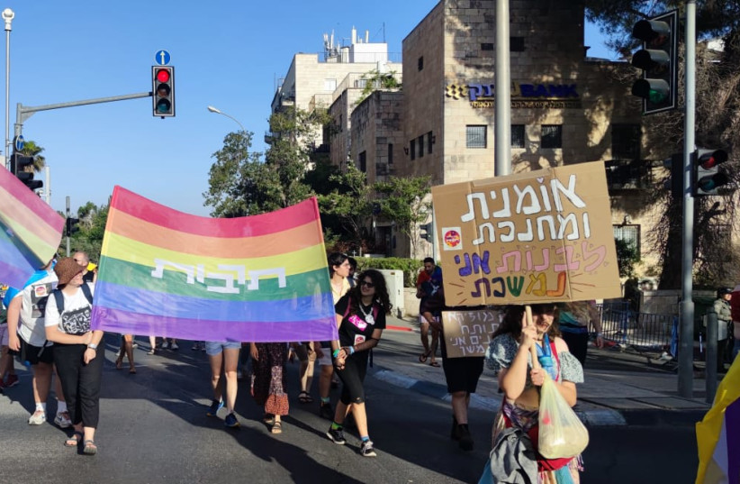   People marching in the 2022 Jerusalem Pride parade. (credit: TZVI JOFFRE)