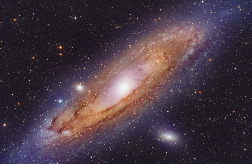  The Andromeda Galaxy is the nearest large spiral galaxy from the Earth, and contains within itself over a trillion stars.  (credit: Wikimedia Commons)