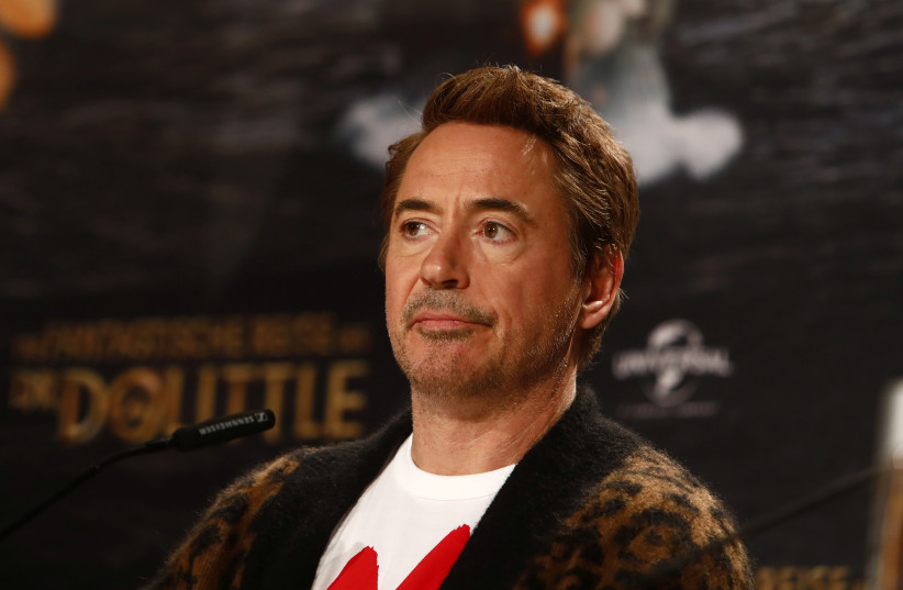  Actor Robert Downey Jr. presents their new movie "The Voyage of Doctor Dolittle" in Berlin, Germany January 20, 2020.  (photo credit: REUTERS/MICHELE TANTUSSI)