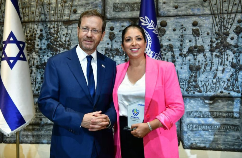  Shira Ruderman with President Isaac Herzog. (credit: MEIR ELIPOUR)