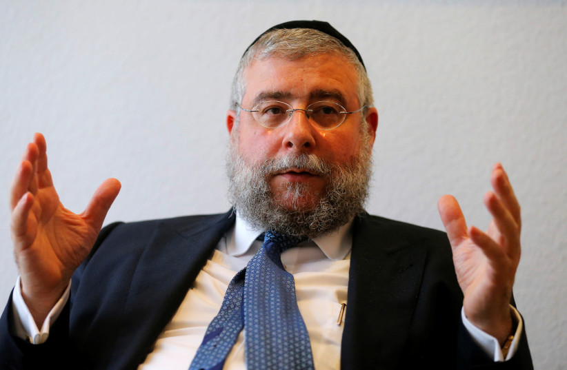  President of the Conference of European Rabbis Pinchas Goldschmidt talks during an interview with Reuters in Vienna, Austria, May 31, 2016. (photo credit: REUTERS/HEINZ-PETER BADER)