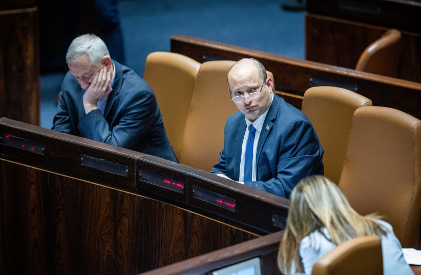 Israeli Prime Minister Naftali Bennett seen during a discussion and a vote on the ''settler law bill'' at the Knesset on June 6, 2022 (credit: YONATAN SINDEL/FLASH90)