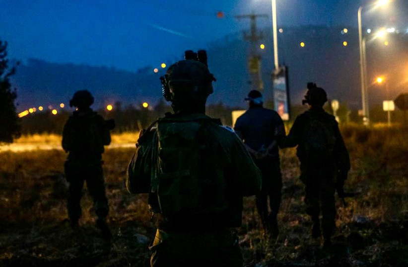  Israeli security forces conducting an arrest raid in the West Bank, June 8, 2022. (photo credit: IDF SPOKESPERSON UNIT)