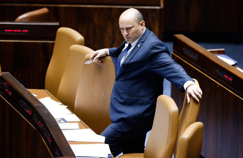  Prime Minister Naftali Bennett attends a discussion and a vote on The vote on the "Flag Bill" at the Knesset, the Israeli parliament in Jerusalem on June 1, 2022 (photo credit: OLIVIER FITOUSSI/FLASH90)