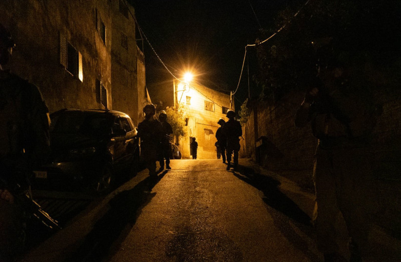Israeli security forces arrest 12 suspects in the West Bank overnight, June 9, 2022. (photo credit: IDF SPOKESMAN’S UNIT)