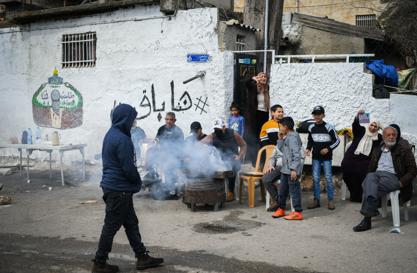  DREARY DAYS: In the east Jerusalem neighborhood Sheikh Jarrah, February 27.  (credit: Arie Leib Abrams/Flash90)