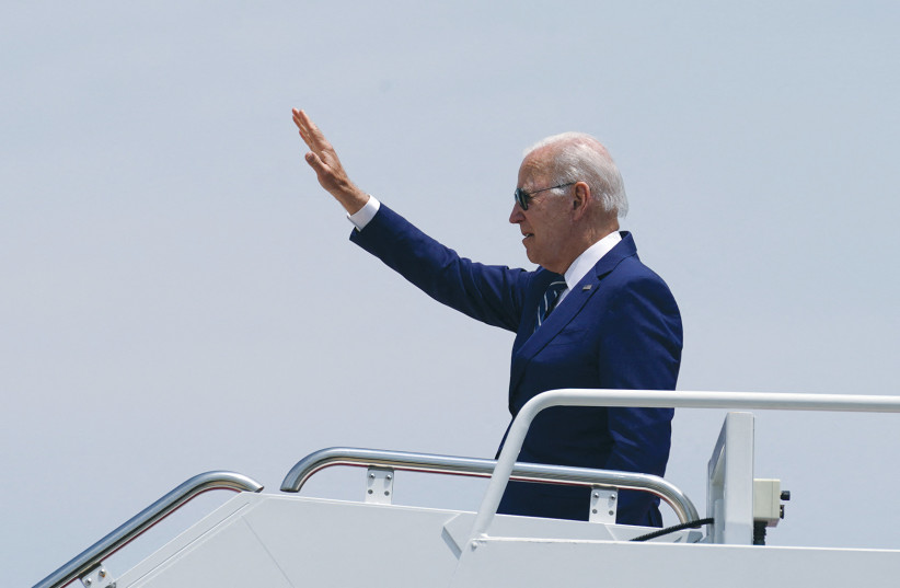  US PRESIDENT Joe Biden waves as he boards Air Force One for a flight to Los Angeles this week. If Biden is coming to the Mideast to criticize and slow Israeli building in Judea and Samaria and greater Jerusalem, pull back, says the writer. (credit: KEVIN LAMARQUE/REUTERS)